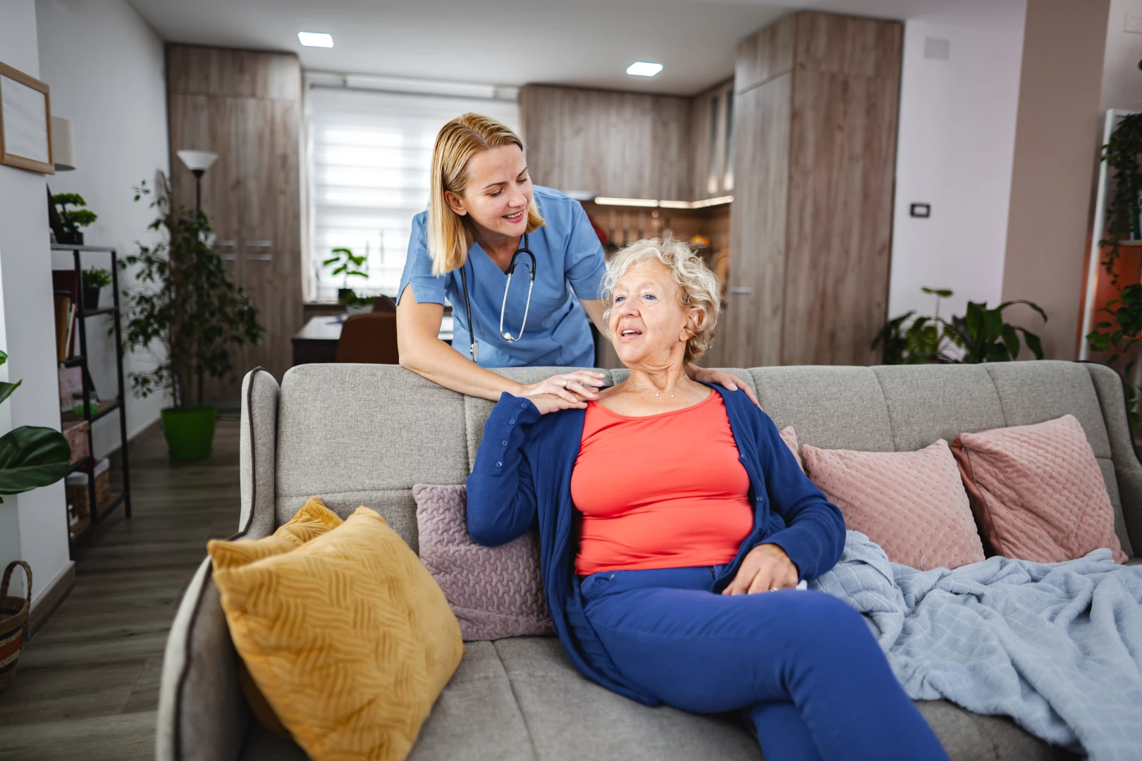 Carer with client at home